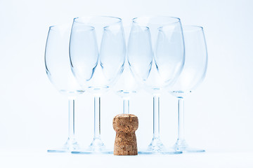 Image showing glass wine stand symmetrically with cork