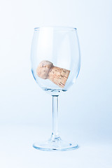 Image showing single glass of wine with cork from a bottle