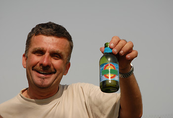 Image showing man and beer