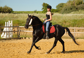 Image showing horse and woman in dressage