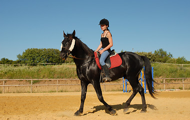 Image showing horse and woman in dressage