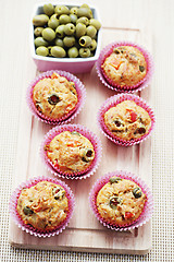 Image showing muffins with green olives