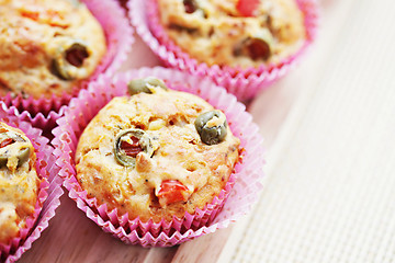 Image showing muffins with green olives