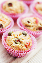 Image showing muffins with green olives