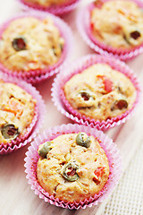 Image showing muffins with green olives