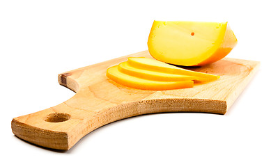 Image showing cheese slices on cutting board