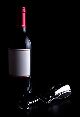 Image showing bottle of wine and corkscrew