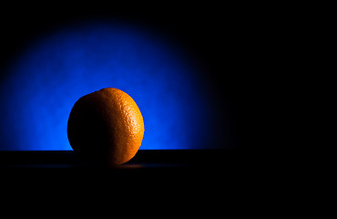 Image showing crescent orange in blue light