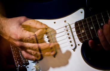 Image showing guitar playing in the move