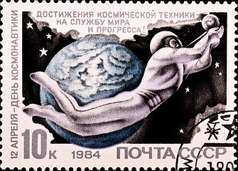 Image showing postage stamp shows man flying in space