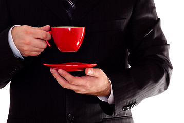 Image showing man in black suit hold coffee cup