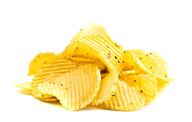 Image showing handful of yellow potato chips