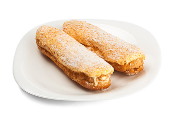 Image showing two tasty eclairs on dish