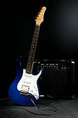 Image showing electric guitar and combo amplifier