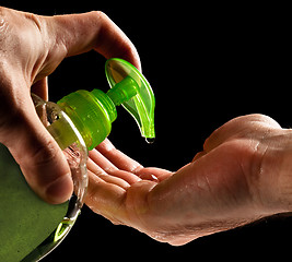 Image showing washing hands with liquid soap