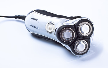 Image showing electric shaver on grey background
