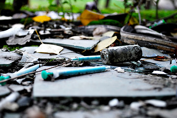 Image showing narcotic syringes in the junkyard