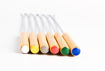 Image showing colored fondue forks