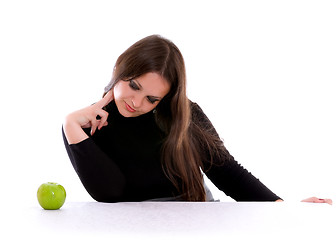 Image showing girl staring at the apple