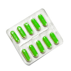 Image showing package of green capsules