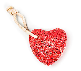 Image showing red heart-shaped stone with rope