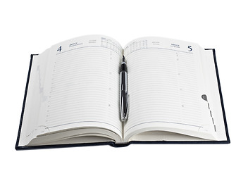 Image showing fountain pen on opened diary