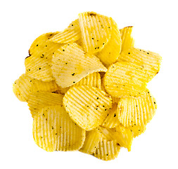 Image showing handful of yellow potato chips