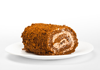 Image showing chocolate roll on white dish