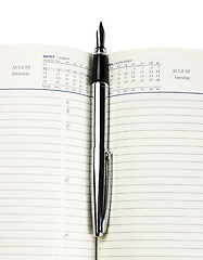 Image showing fountain pen on diary