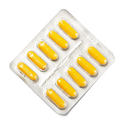 Image showing package of yellow capsules