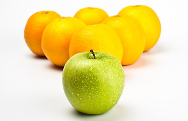 Image showing oranges and apple like billiard balls