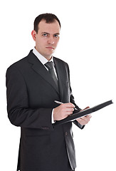 Image showing businessman with pen and notepad