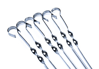 Image showing metal skewers set closeup