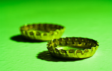 Image showing two beer caps