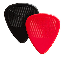 Image showing two ribbed guitar plectrums