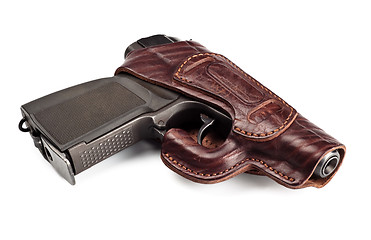 Image showing vintage pistol in leather holster