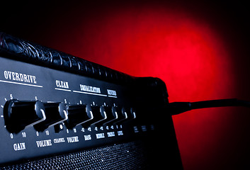 Image showing combo amplifier on red background