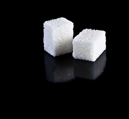 Image showing sugar in black