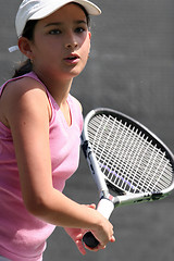 Image showing Young girl playing tennis