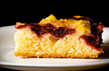 Image showing berry pie with nuts on white dish