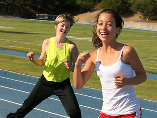 Image showing Mother and daughter exercising