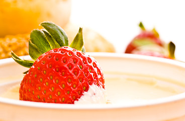 Image showing strawberry in sour cream