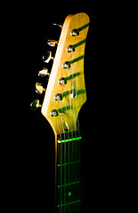 Image showing guitar neck in the dark