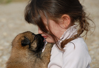 Image showing sad girl and puppy