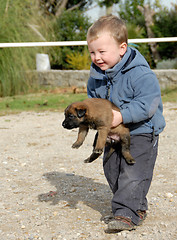 Image showing little boy and puppy