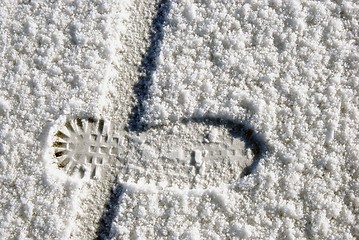 Image showing Human foot and bicycle wheel imprint 