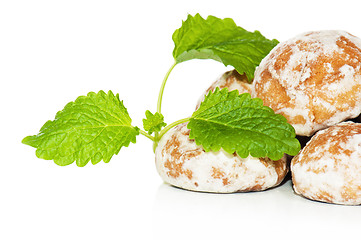 Image showing gingerbread and Peppermint leaves, isolated on white