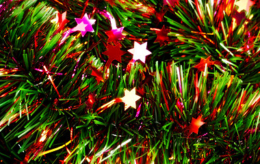 Image showing christmas tinsel with stars