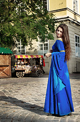 Image showing medieval girl on street