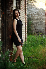 Image showing girl standing amongst ruins